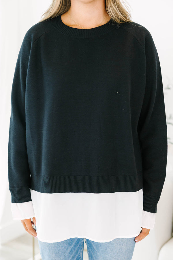 Chic Soul plus size clothing, black long sleeve knit sweater top with round neckline and cuff sleeves with white button up shirt underneath peeking out the bottom and sleeves