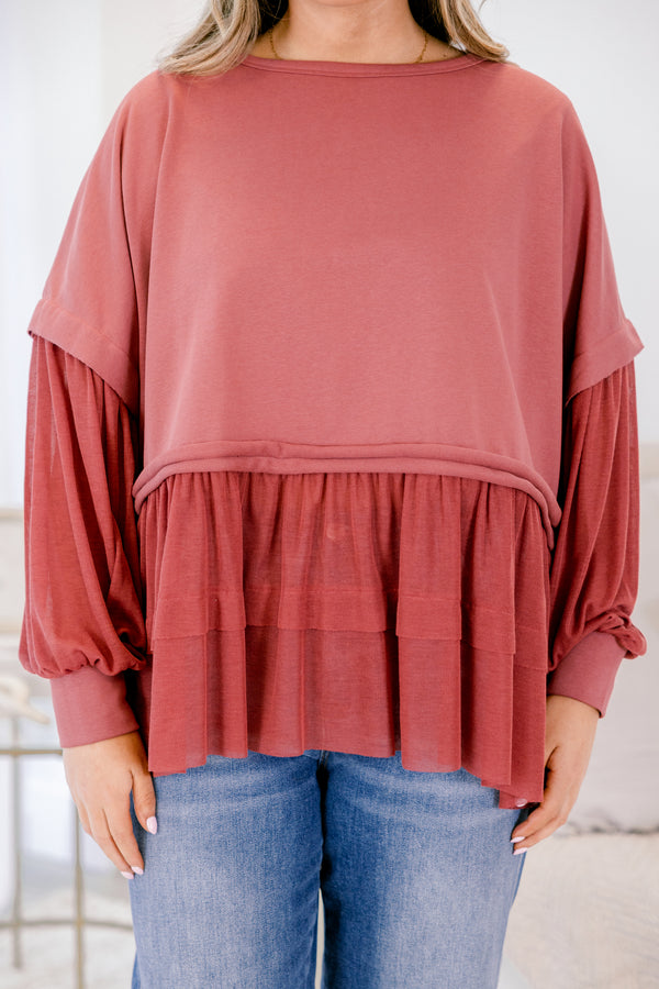 Chic Soul plus size clothing, dark mauve/burgundy long sleeve top with round neckline and cuff sleeves with tiered ruffle detail along the bottom