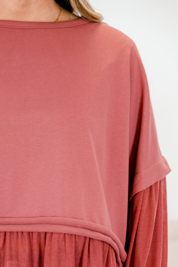 Chic Soul plus size clothing, dark mauve/burgundy long sleeve top with round neckline and cuff sleeves with tiered ruffle detail along the bottom