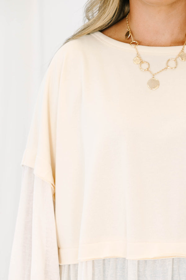 Chic Soul plus size clothing, long-sleeve oatmeal tan ruffled babydoll top with contrast materials on sleeve and bottom of the top