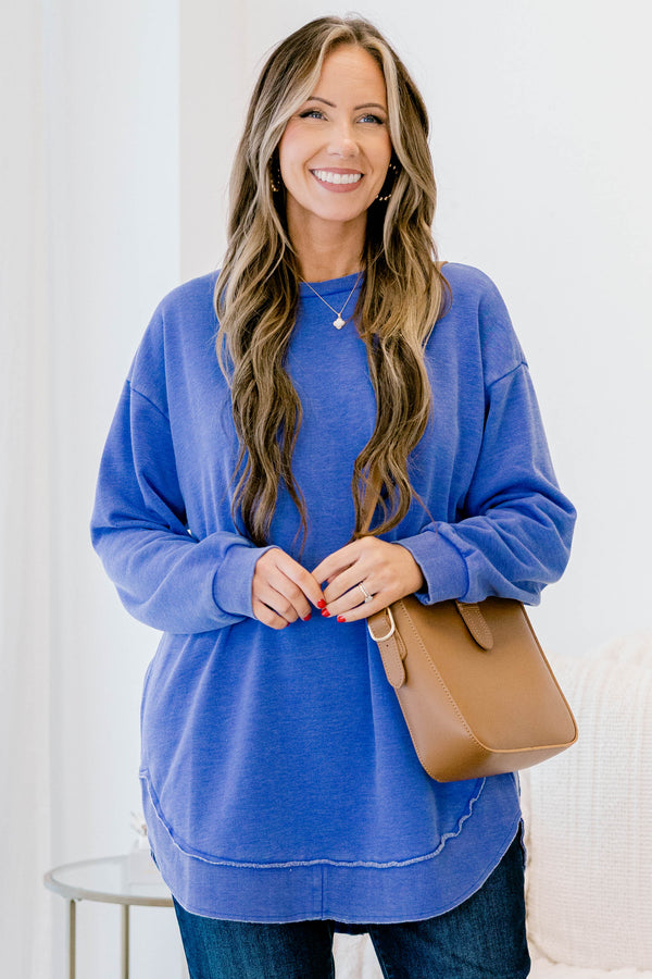 Chic Soul plus size clothing, royal blue long sleeve curved hem top with exposed seam at the waistband 
