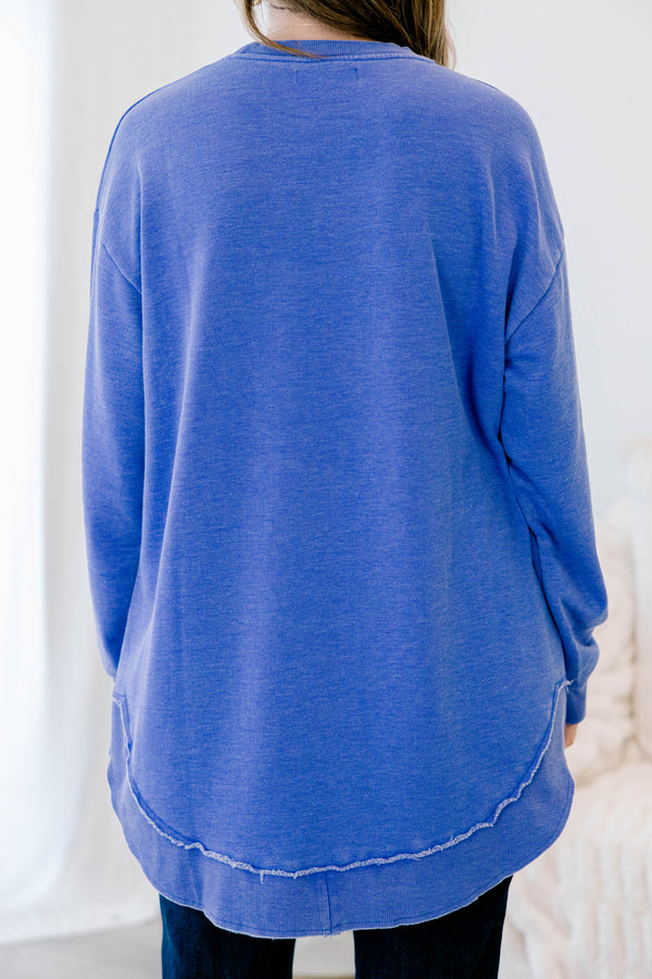 Chic Soul plus size clothing, royal blue long sleeve curved hem top with exposed seam at the waistband 
