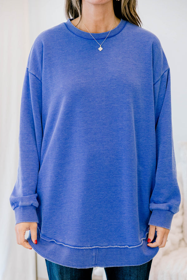Chic Soul plus size clothing, royal blue long sleeve curved hem top with exposed seam at the waistband 
