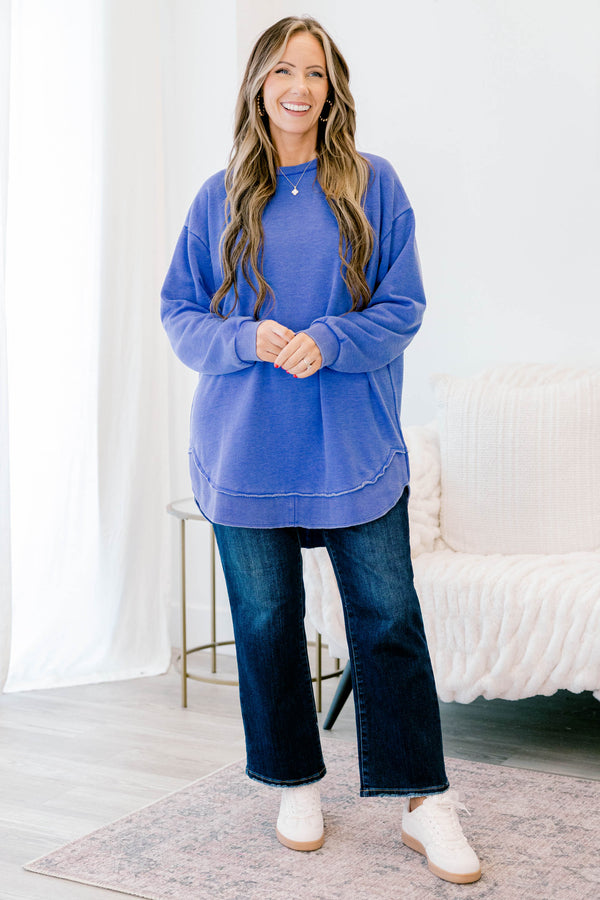 Chic Soul plus size clothing, royal blue long sleeve curved hem top with exposed seam at the waistband 

