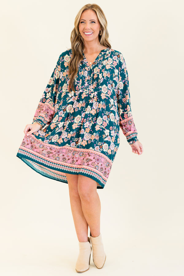 Chic Soul plus size clothing, teal multicolored floral print long sleeve flowy mini dress with wide cuff sleeves with v neckline and pink floral band detail along bottom and sleeves