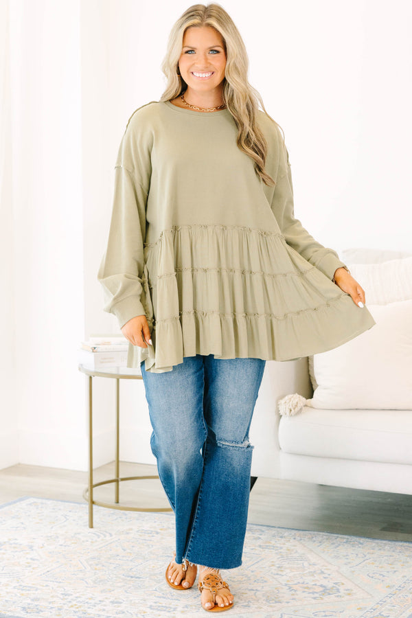 Chic Soul plus size clothing, olive long sleeve top with round neckline and cuff sleeves with tiered ruffle detail along the bottom