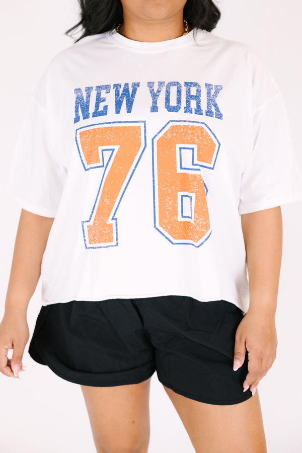 Chic Soul plus size clothing, White short sleeve graphic tee with the number 76 printed in a orange block font and outlined in a blue as well as the word 