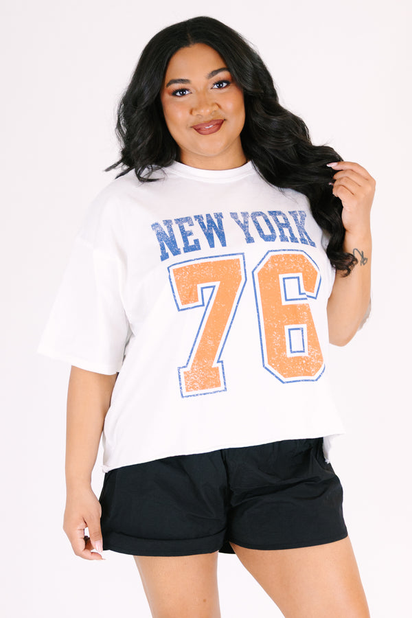 Chic Soul plus size clothing, White short sleeve graphic tee with the number 76 printed in a orange block font and outlined in a blue as well as the word 
