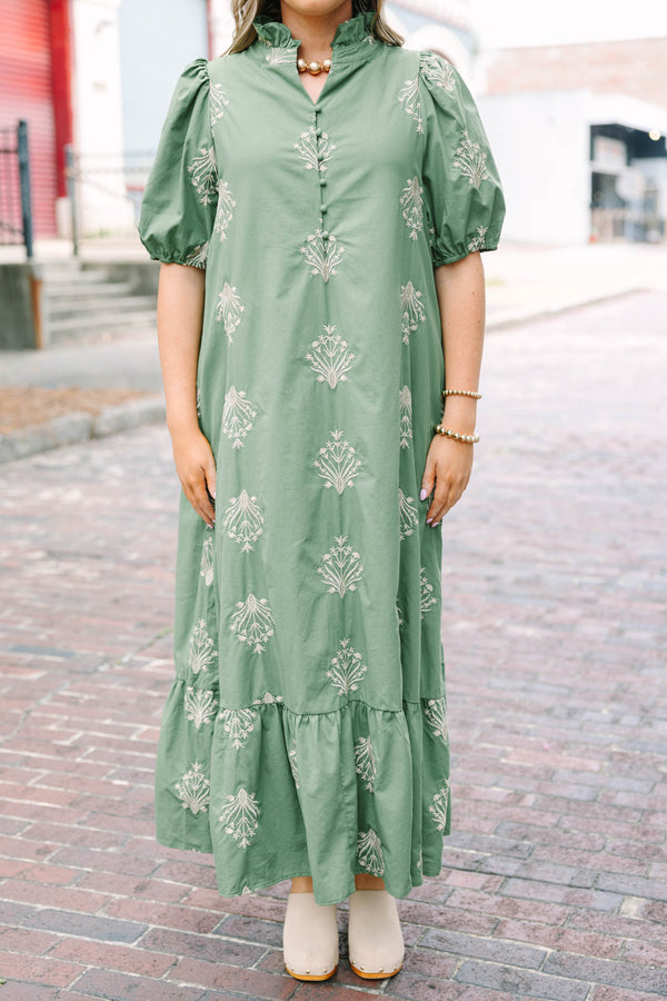 Plus Size olive green midi dress with cream botanical embroidery, puff sleeves, and a ruffled hem.