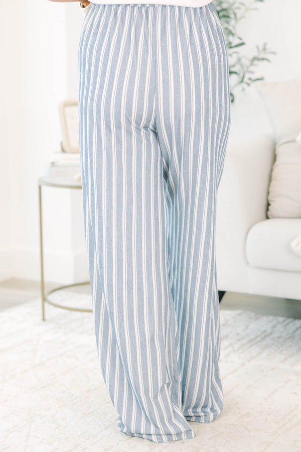 Plus Size blue and off-white vertical striped wide-leg pants with a high-waisted fit.