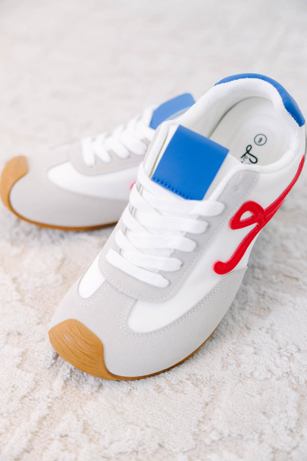 Plus Size white sneakers with grey suede trim, blue tongue, red side detail, and gum soles.