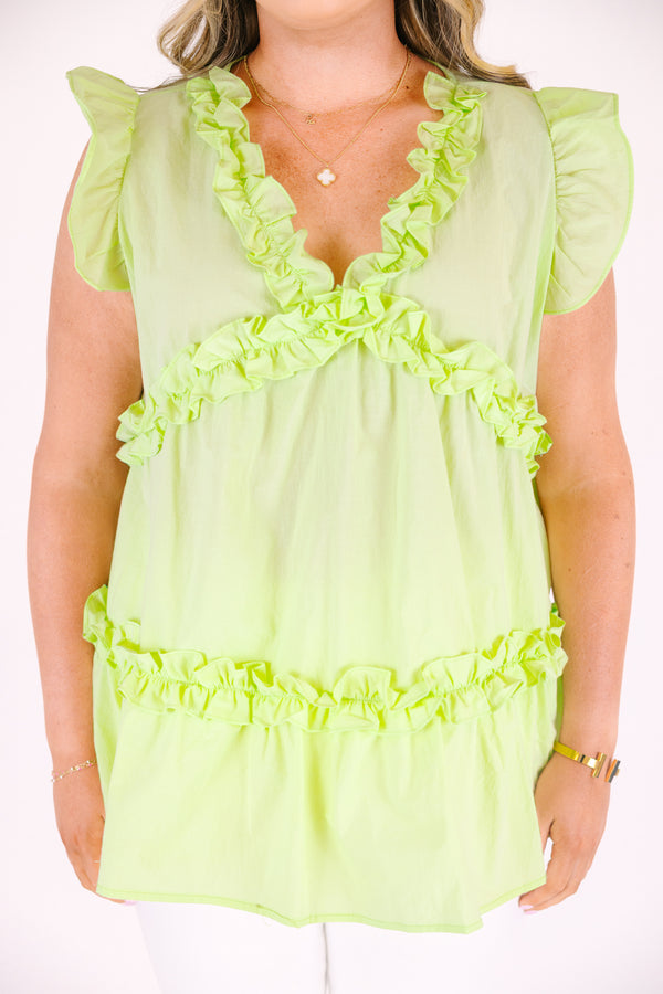 Plus Size light green cotton top with flutter sleeves, ruffle trim, and a V-neckline.