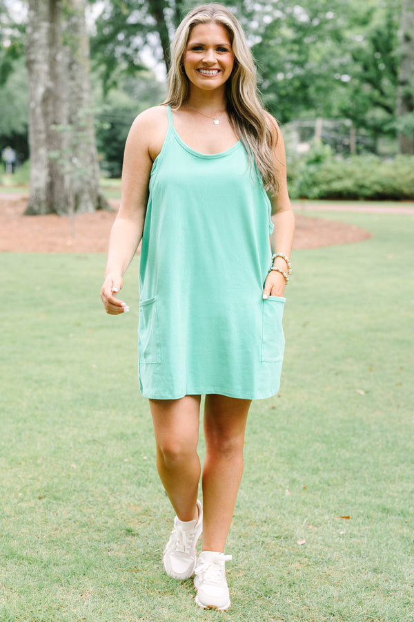 Chic Soul plus size clothing, green strapless active dress with shorts underneath and two front pockets at the bottom of the dress