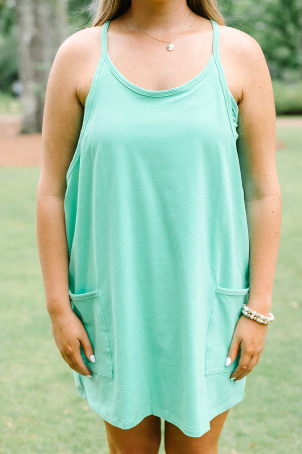 Chic Soul plus size clothing, green strapless active dress with shorts underneath and two front pockets at the bottom of the dress