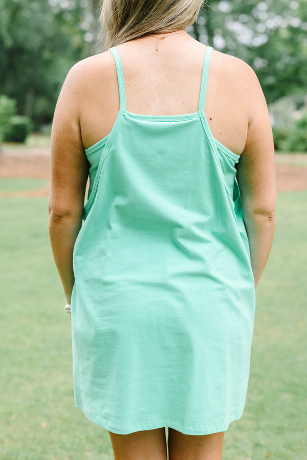 Chic Soul plus size clothing, green strapless active dress with shorts underneath and two front pockets at the bottom of the dress