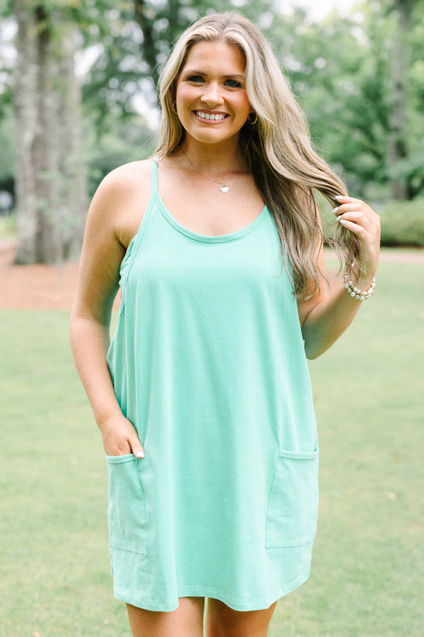 Chic Soul plus size clothing, green strapless active dress with shorts underneath and two front pockets at the bottom of the dress