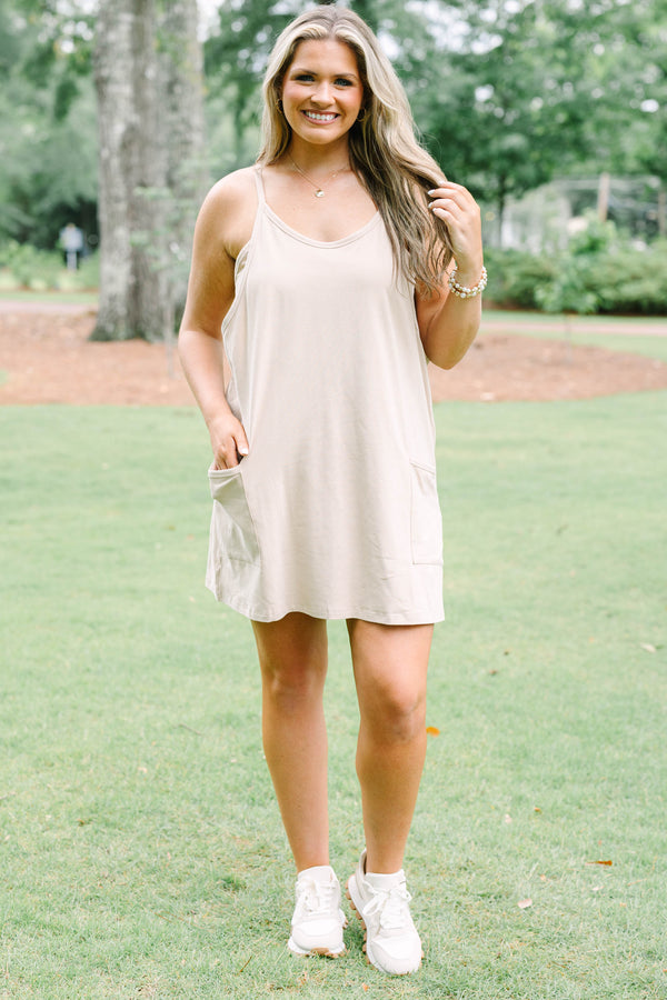 Chic Soul plus size clothing, taupe sleeveless athletic dress with a scooped neckline and pockets on the front of the dress