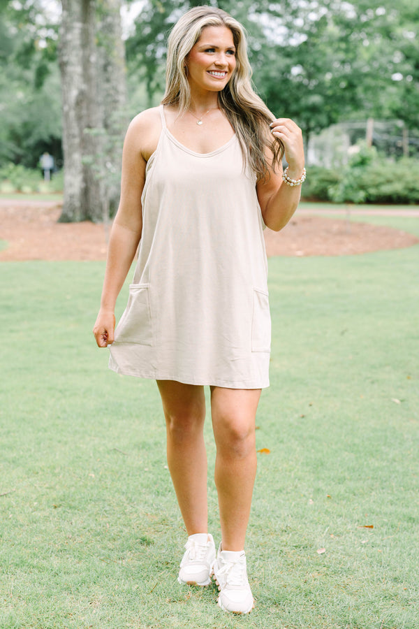 Chic Soul plus size clothing, taupe sleeveless athletic dress with a scooped neckline and pockets on the front of the dress