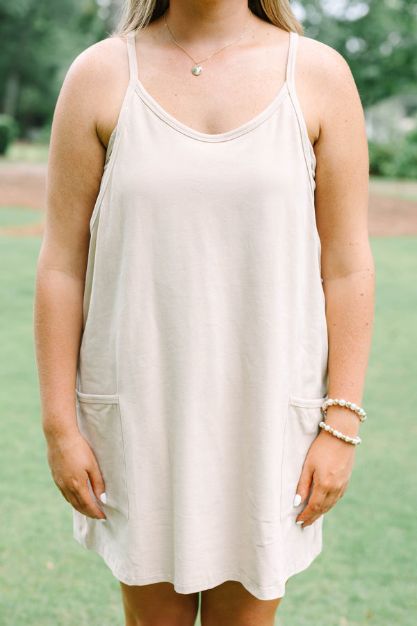 Chic Soul plus size clothing, taupe sleeveless athletic dress with a scooped neckline and pockets on the front of the dress