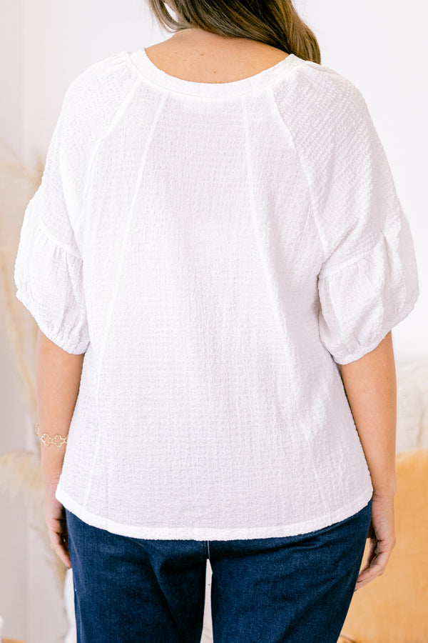 Chic Soul plus size clothing, white short sleeve blouse with round neckline and bubble sleeve detail along the bottom 