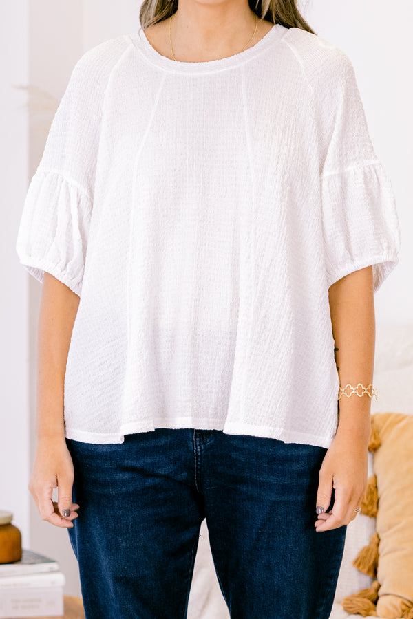 Chic Soul plus size clothing, white short sleeve blouse with round neckline and bubble sleeve detail along the bottom 