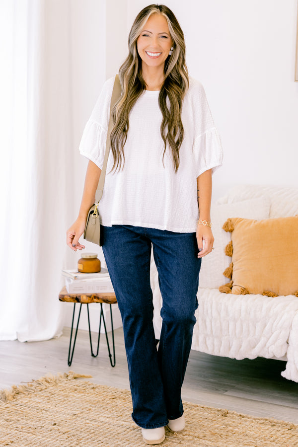 Chic Soul plus size clothing, white short sleeve blouse with round neckline and bubble sleeve detail along the bottom 