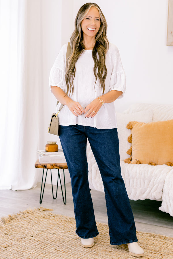 Chic Soul plus size clothing, white short sleeve blouse with round neckline and bubble sleeve detail along the bottom 