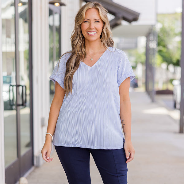 Plus Size light blue v-neck top with silky ribbed fabric and cuffed short sleeves.