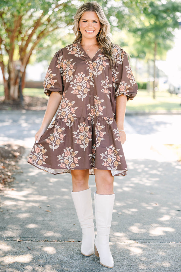 Plus Size brown floral mini dress with puff sleeves, a v-neckline, and a tiered skirt.
