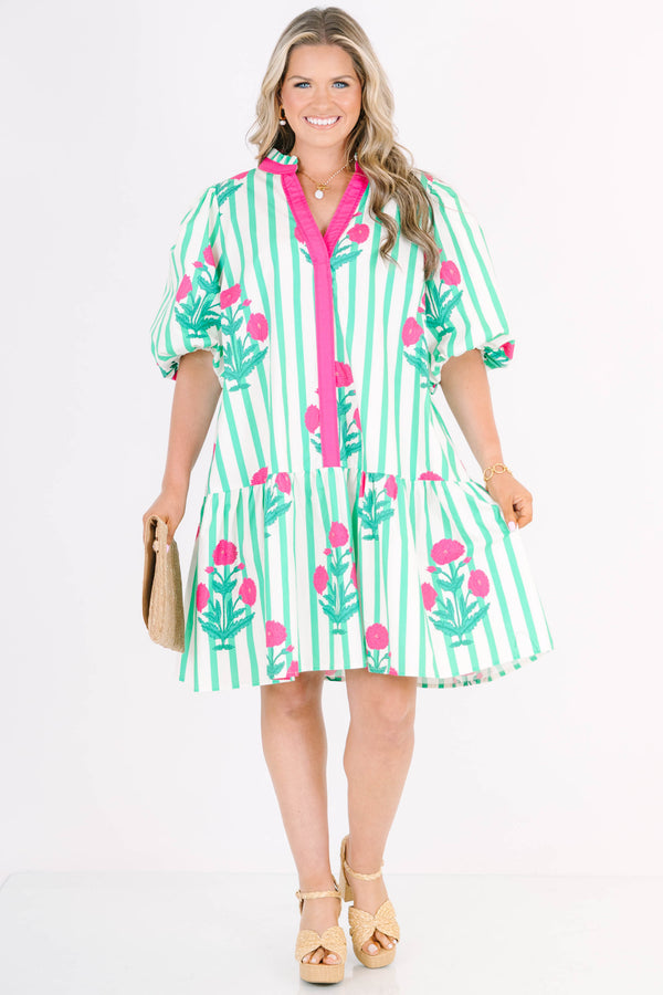 Plus Size green and white striped dress with pink floral print, split v-neck, and puff sleeves.