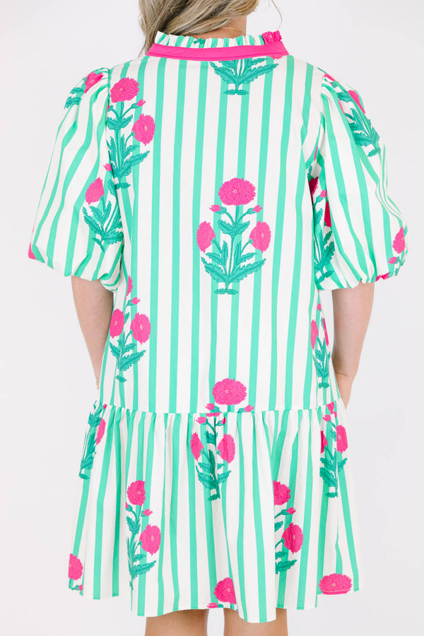Plus Size green and white striped dress with pink floral print, split v-neck, and puff sleeves.