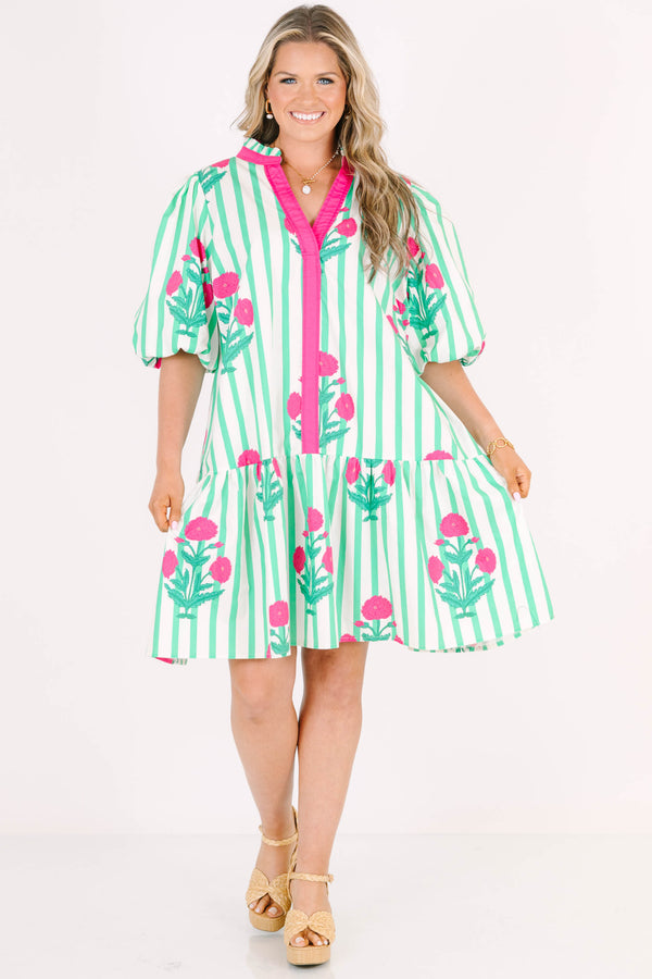 Plus Size green and white striped dress with pink floral print, split v-neck, and puff sleeves.