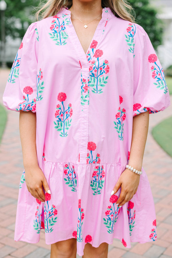 Plus Size pink floral cotton dress with a split v-neck, drop waist, and elastic puff sleeves.