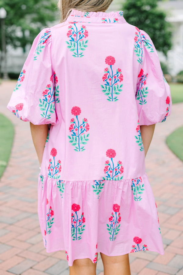Plus Size pink floral cotton dress with a split v-neck, drop waist, and elastic puff sleeves.
