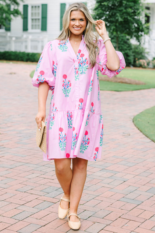 Plus Size pink floral cotton dress with a split v-neck, drop waist, and elastic puff sleeves.