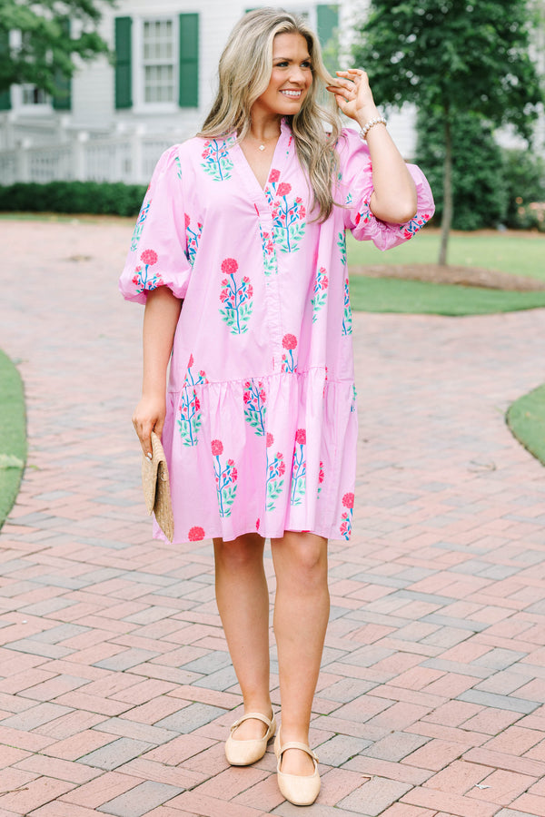 Plus Size pink floral cotton dress with a split v-neck, drop waist, and elastic puff sleeves.