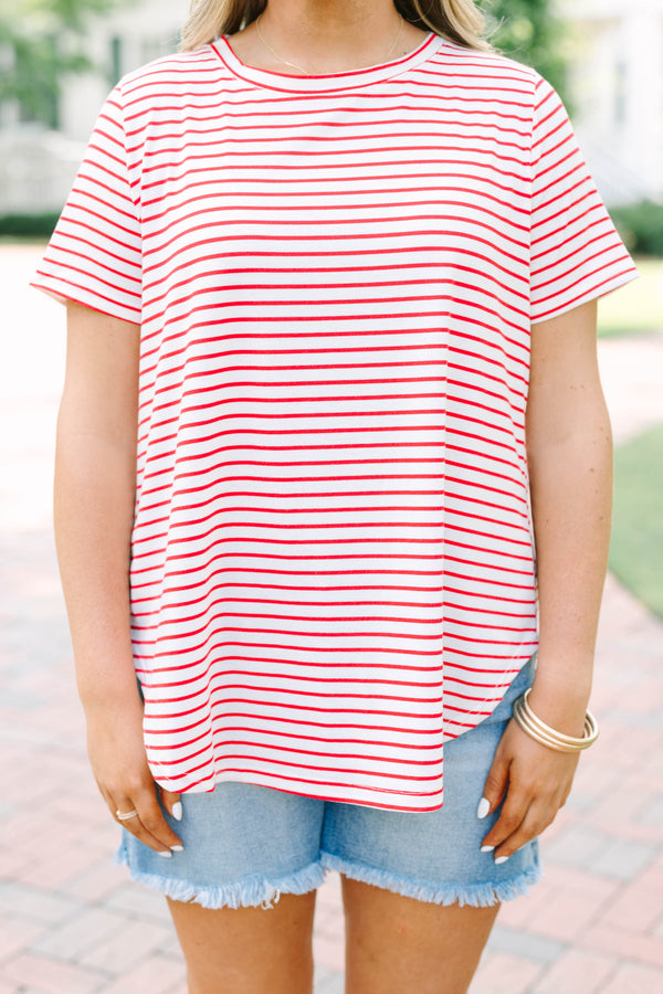 red and white striped plus size top with a relaxed fit and short sleeves.