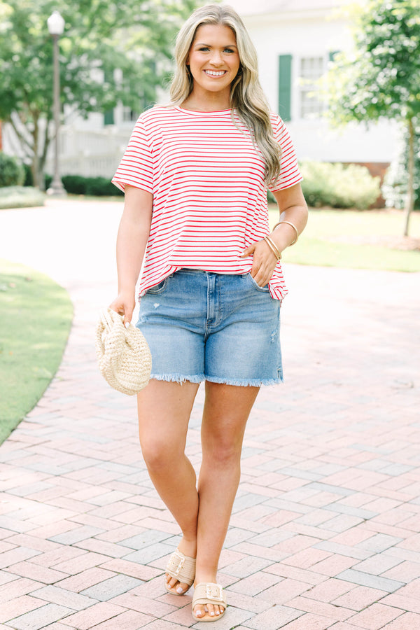 red and white striped plus size top with a relaxed fit and short sleeves.