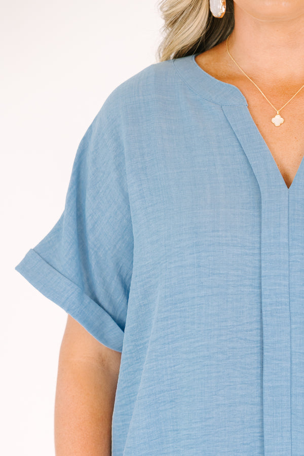 Plus Size chambray short-sleeve top with a split neckline and woven airflow fabric.
