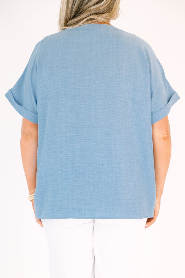 Plus Size chambray short-sleeve top with a split neckline and woven airflow fabric.
