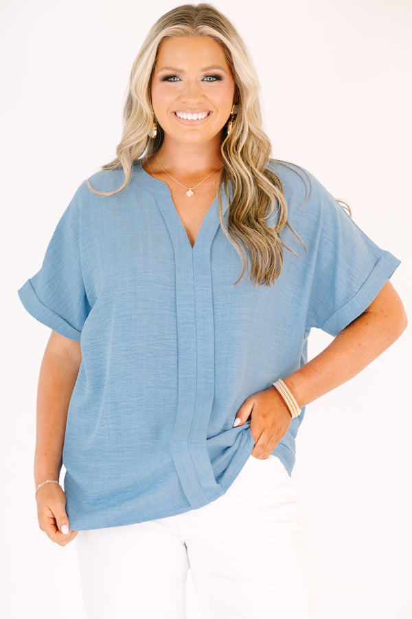 Plus Size chambray short-sleeve top with a split neckline and woven airflow fabric.