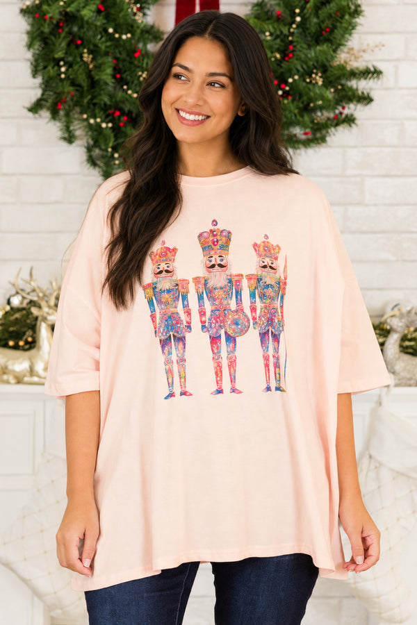 Chic Soul plus size clothing, cream pink short sleeve boyfriend tee with round neckline with 3 multicolor nutcracker graphic design