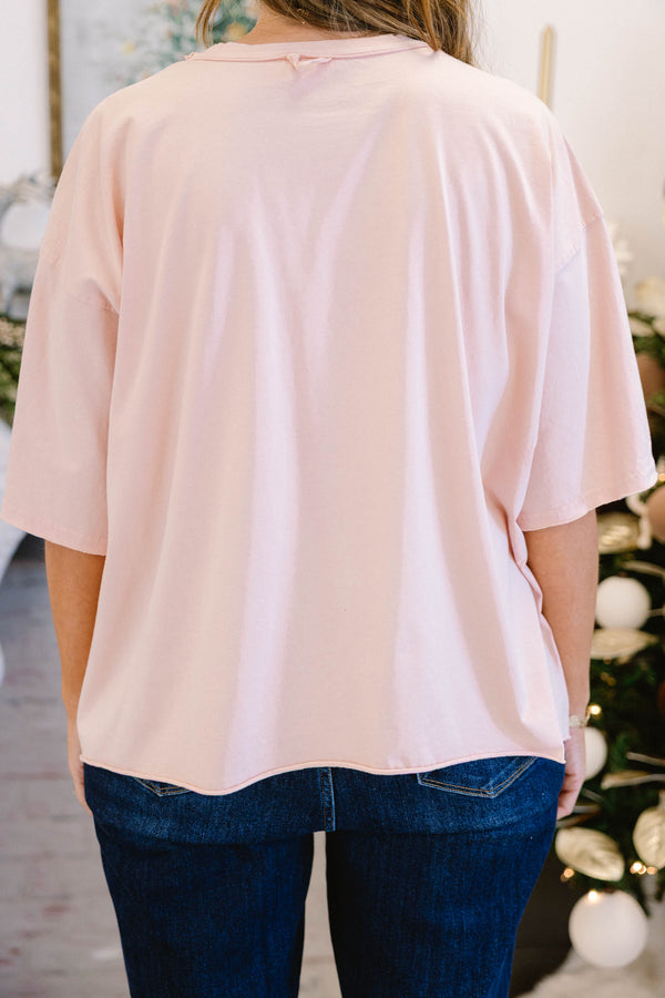 Chic Soul plus size clothing, blush pink short sleeve slightly cropped short top with green wreath with blue bow in the middle and cream pink bows all around and nutcracker in the middle