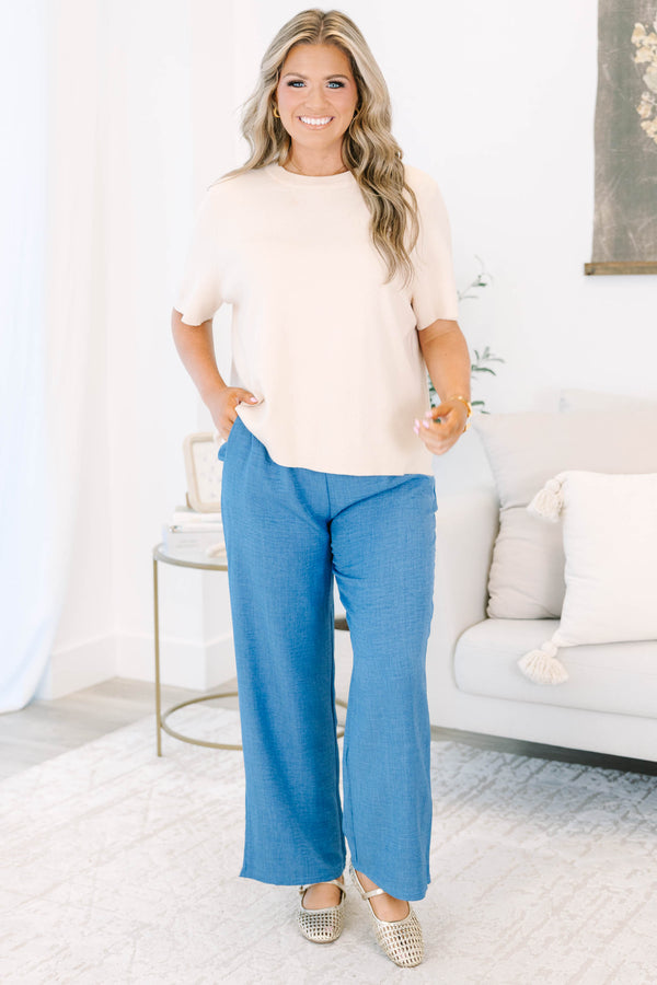 Plus size blue denim-look wide-leg pants with a comfortable elastic waist and flowy fit.
