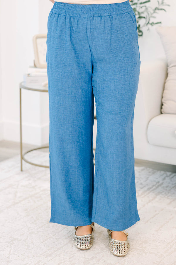 Plus size blue denim-look wide-leg pants with a comfortable elastic waist and flowy fit.