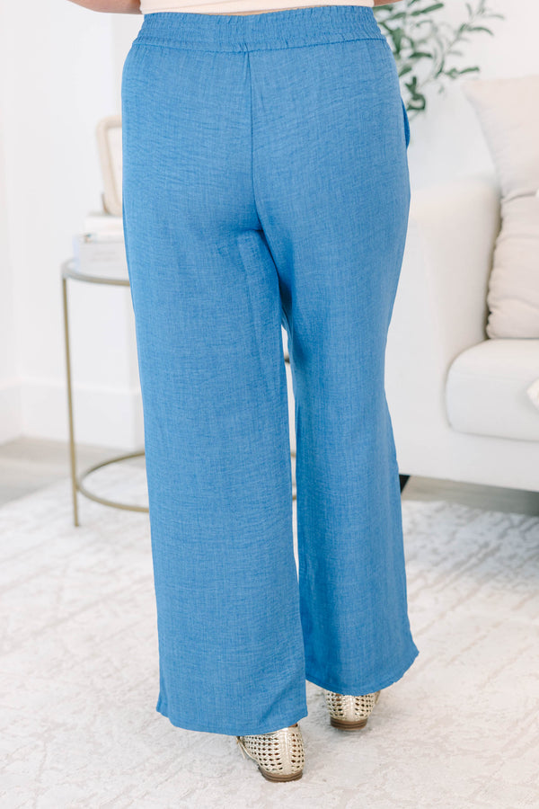 Plus size blue denim-look wide-leg pants with a comfortable elastic waist and flowy fit.