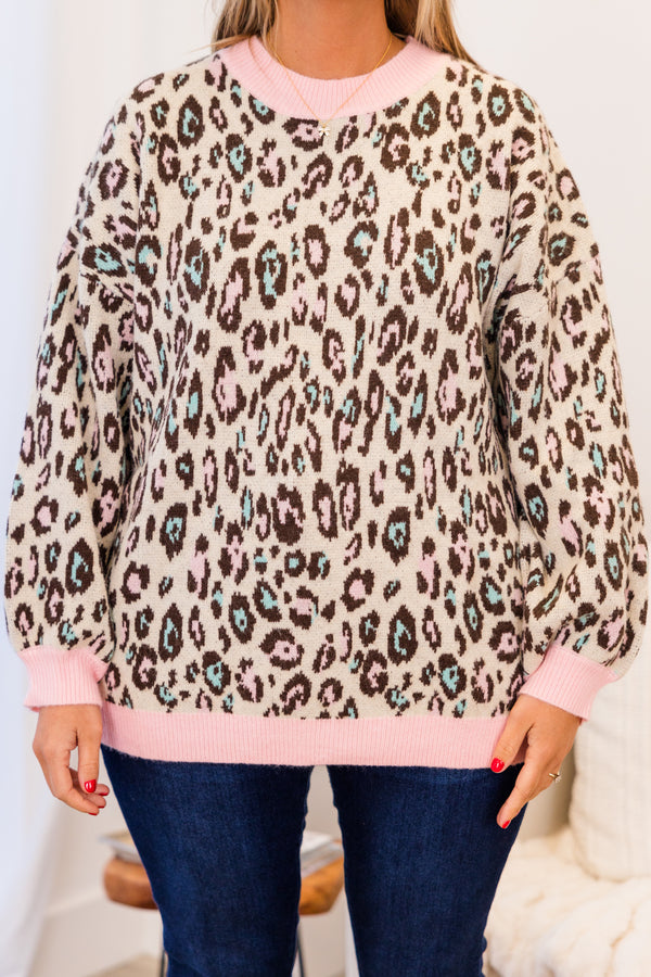 Chic Soul plus size clothing, long-sleeve pink sweater top with brown and turquoise leopard print pattern and color block pink neckline and wrist line