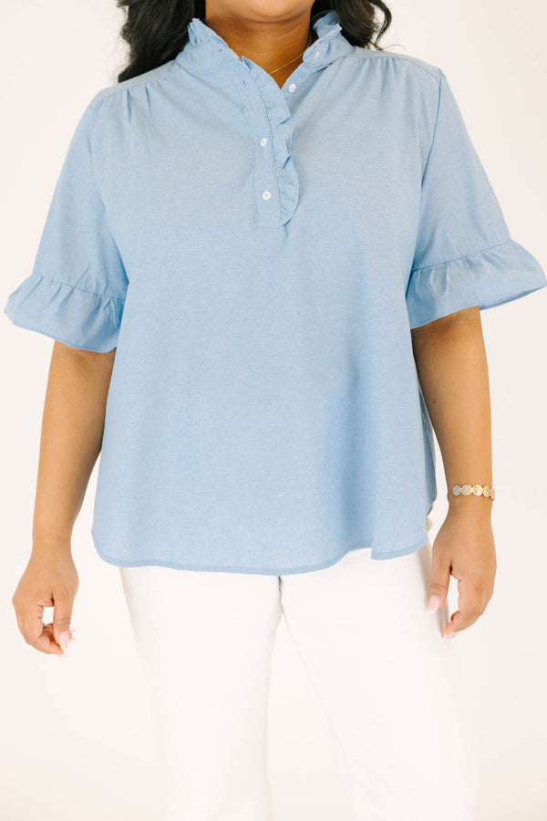 Plus Size chambray top with a ruffled collar, button-up neckline, and short ruffle-cuff sleeves.