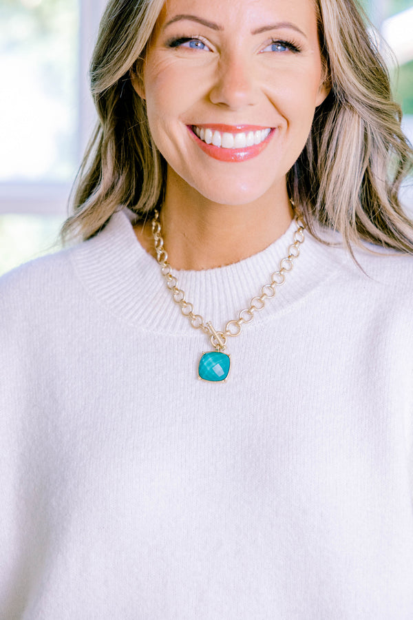 Chic Soul plus size clothing, gold charm necklace with a blue-green square stone that hangs from the center of the necklace