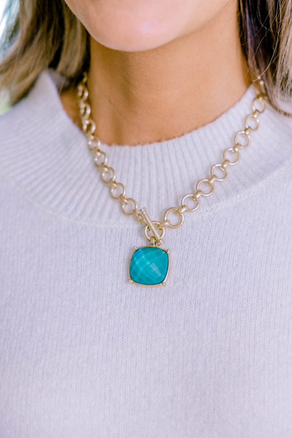 Chic Soul plus size clothing, gold charm necklace with a blue-green square stone that hangs from the center of the necklace